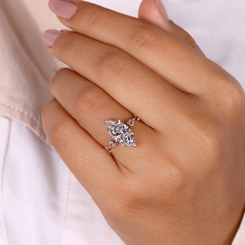 three stone diamond ring marquise cut diamond ring

