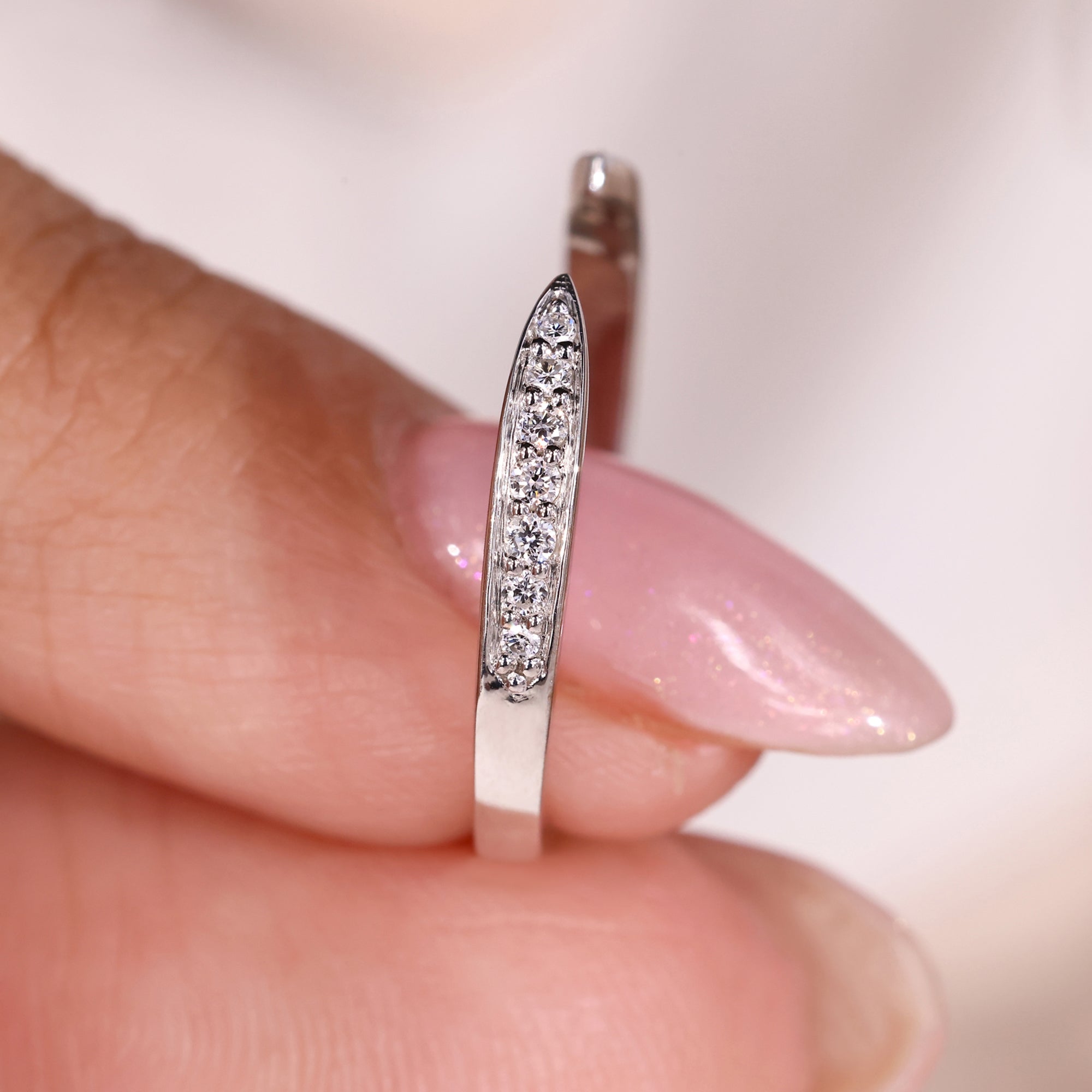 Pinched shank band with white gold wedding band.