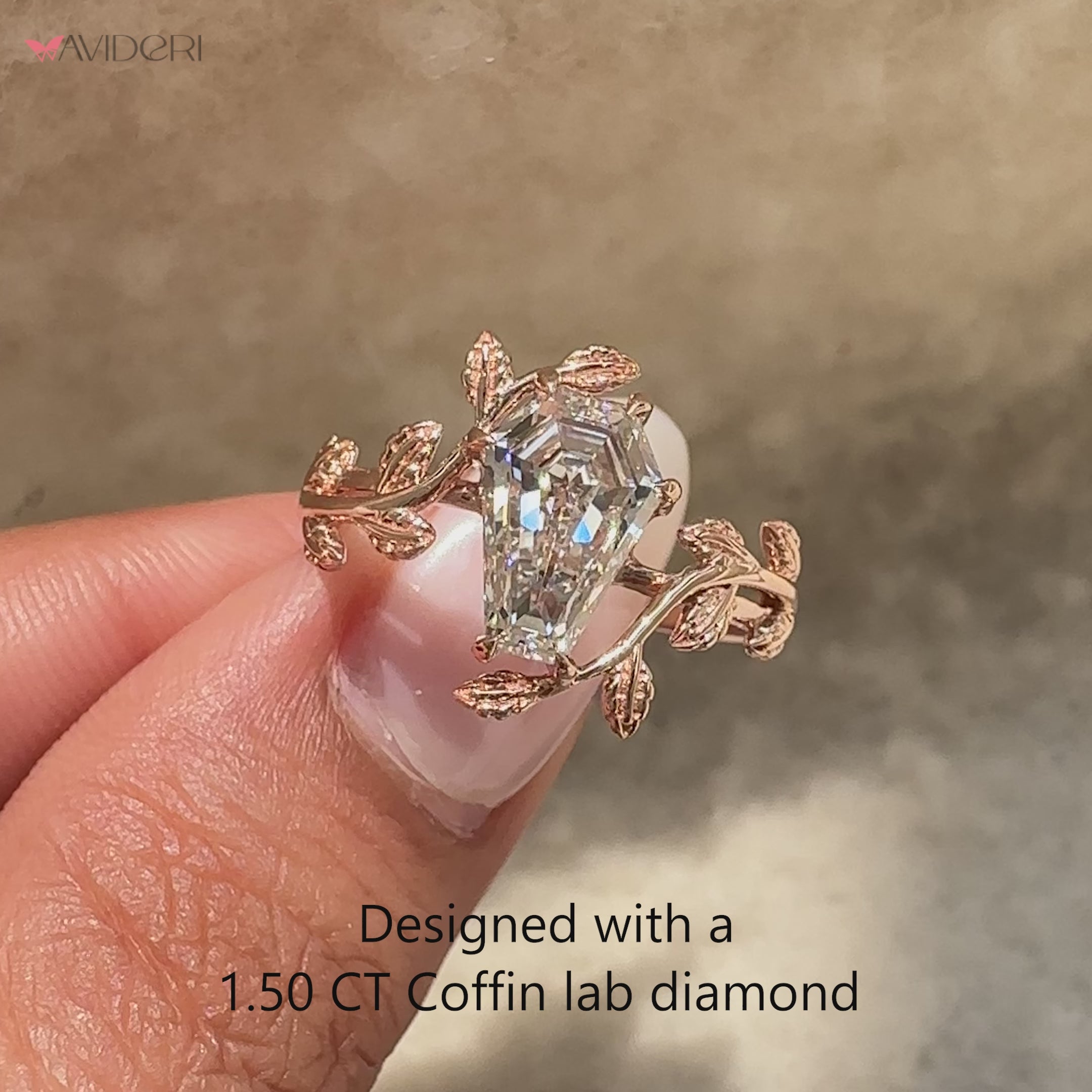 Modern coffin cut diamond engagement ring.
