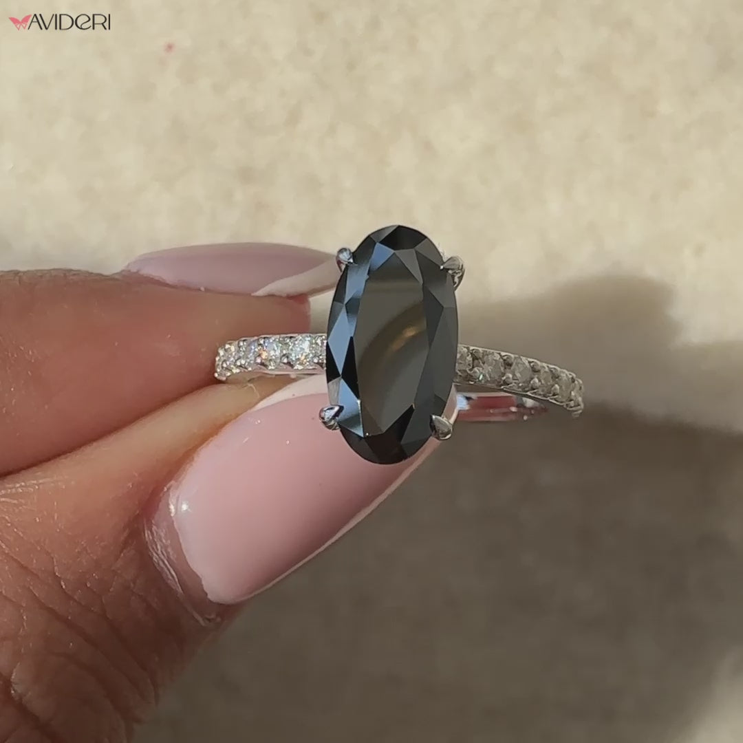 Elegant movel solitaire engagement ring featuring a brilliant center stone.
