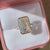 Bezel Set Emerald Cut Diamond Solitaire Ring.