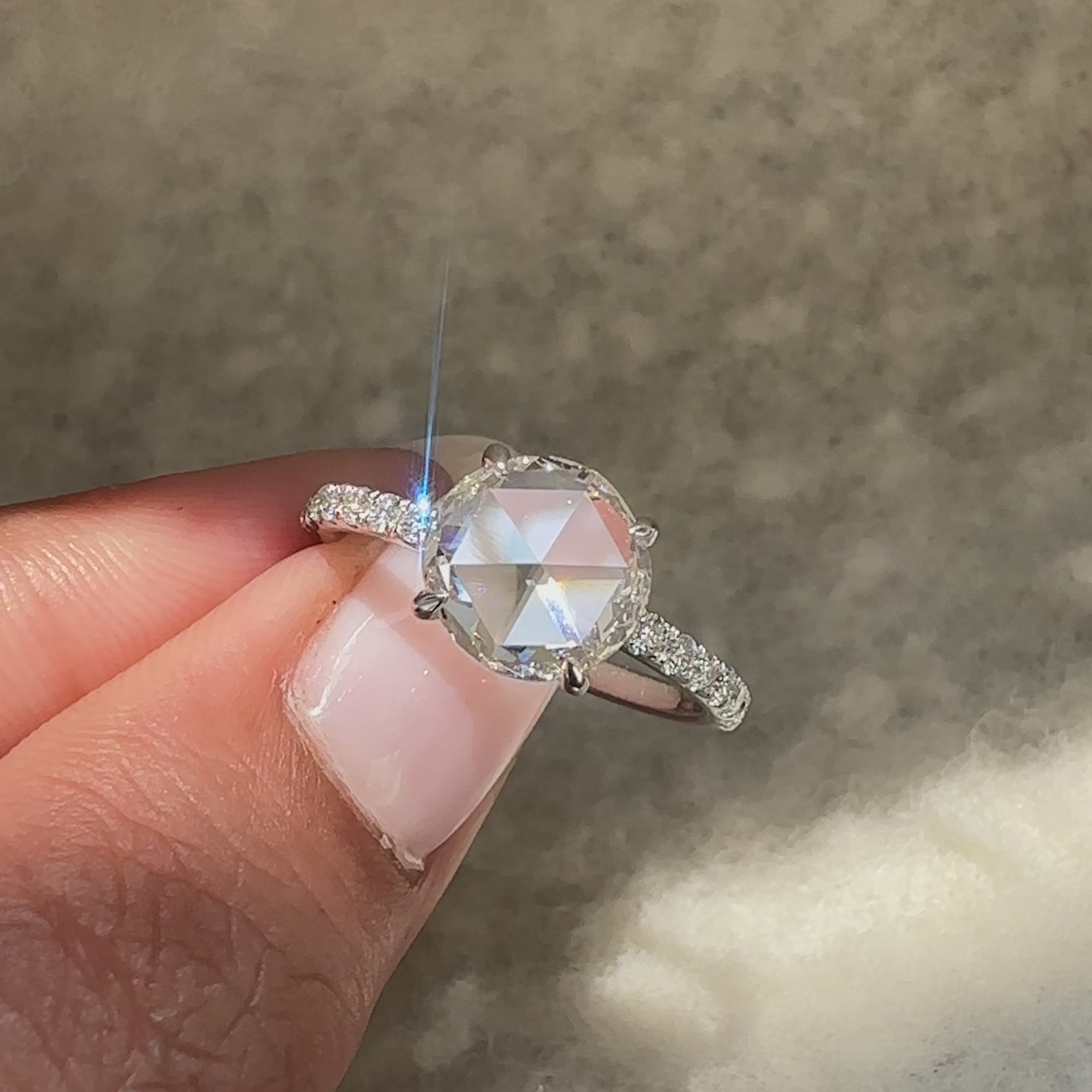 Handmade round rose cut ring with airy gallery design.
