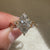 Lab grown marquise engagement ring with basket style setting

