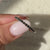 White gold band with a round eternity band for a luxurious look.
