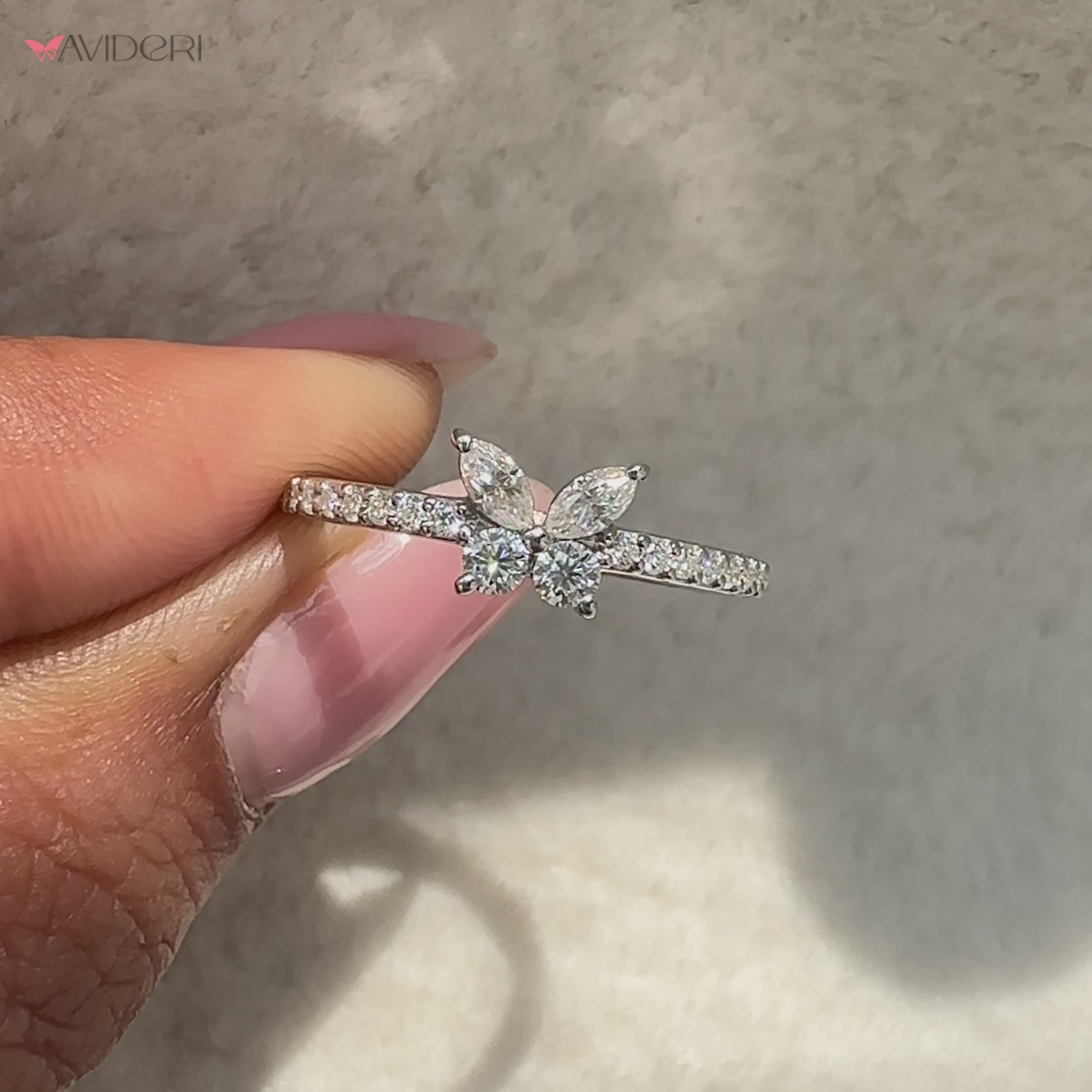 Avideri ring with moissanite and a butterfly motif
