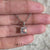 Asscher cut diamond pendant in 4 claw prong style.