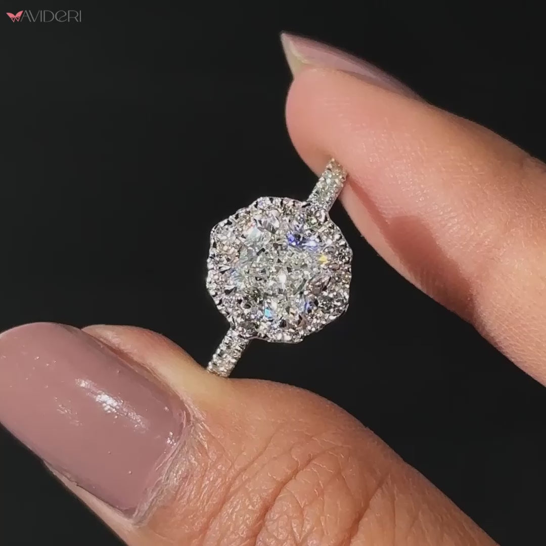 Halo cushion cut diamond surrounded by pavé diamonds, creating a dazzling centerpiece for a unique and elegant look.
