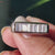 Moissanite wedding band delivers brilliant sparkle with eco-friendly beauty.

