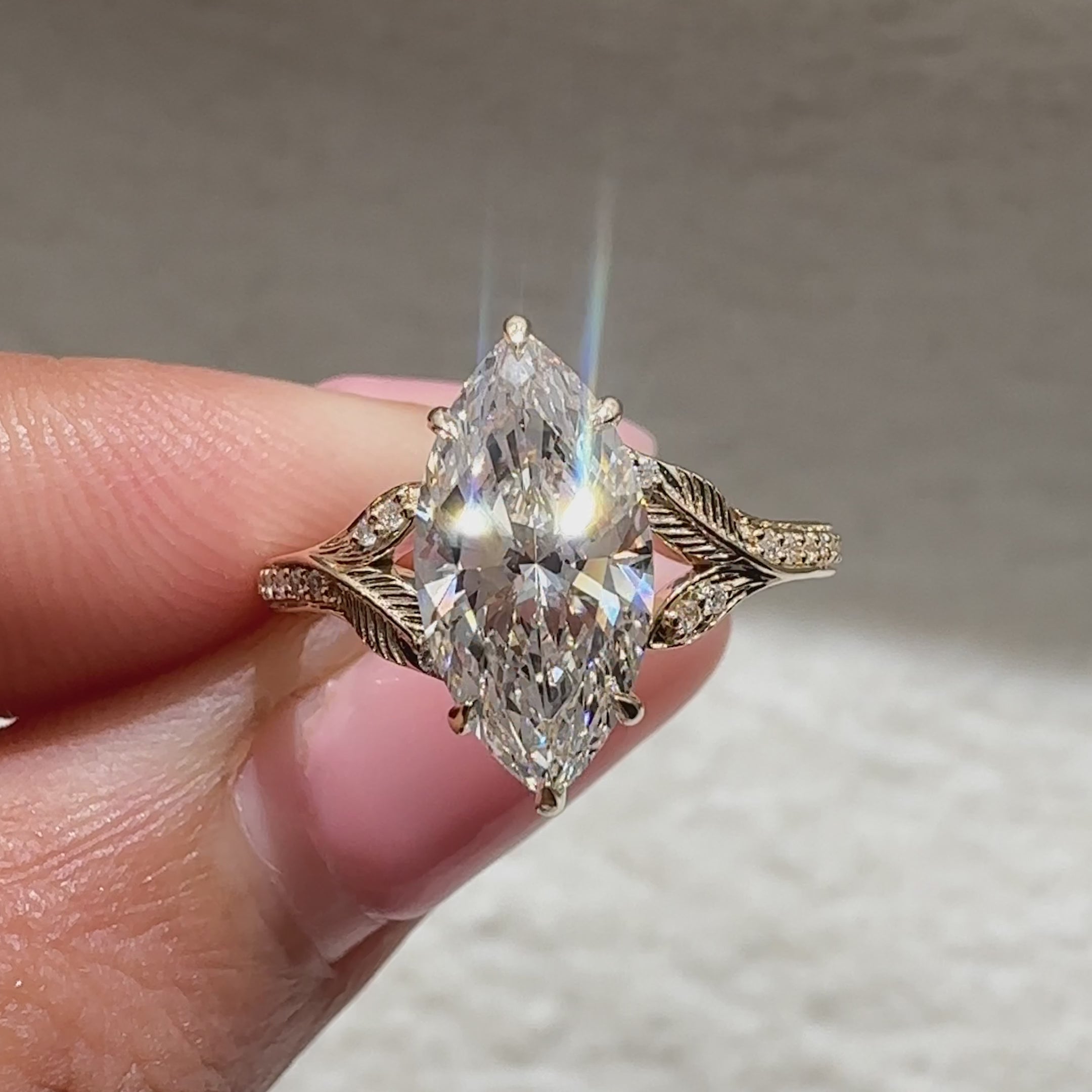 IGI certified diamond ring with marquise center and basket
