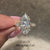 Three stone diamond ring with balanced marquise center and sides.
