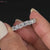 Elegant baguette and round wedding band crafted in white gold.
