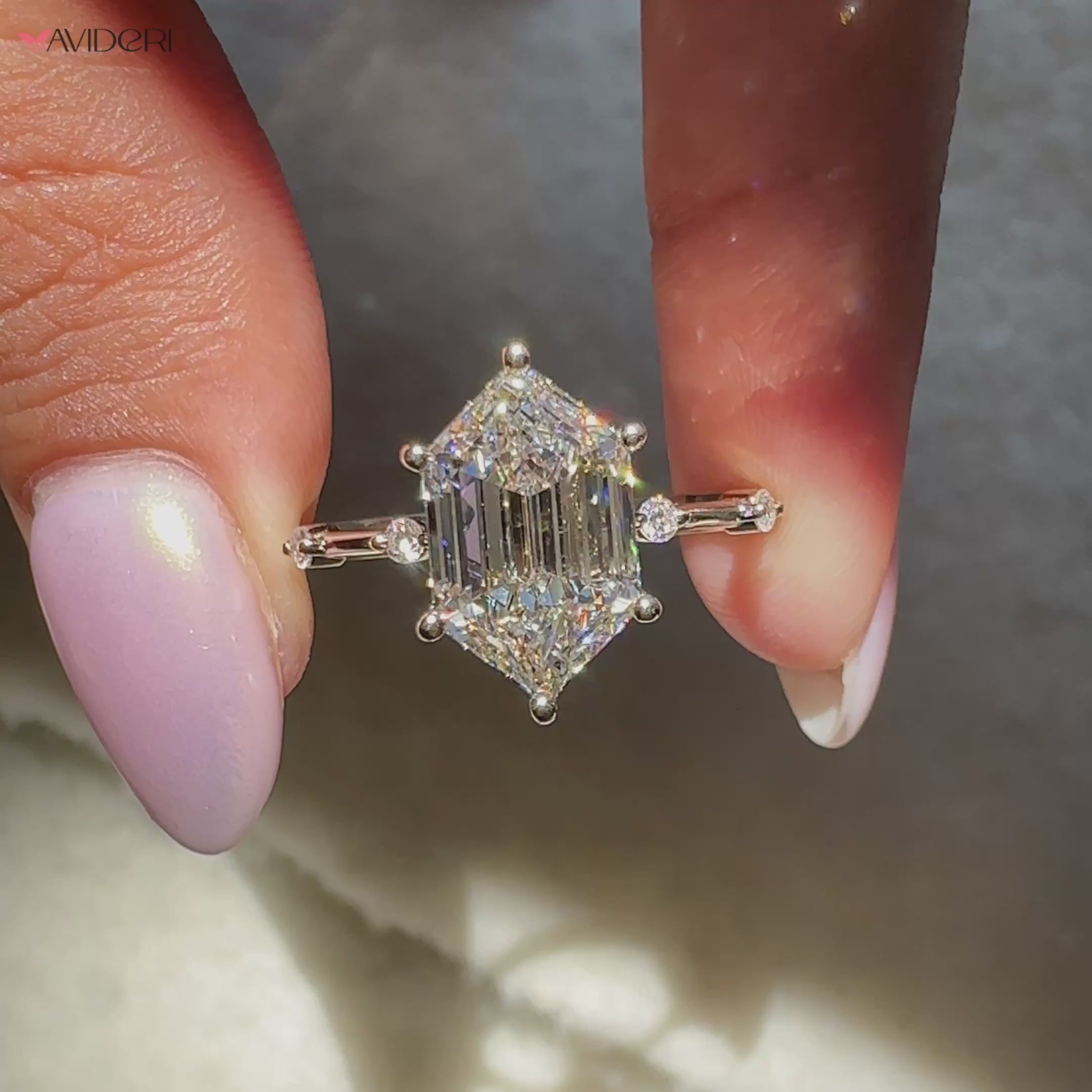 Avideri yellow gold ring with unique 3 carat step cut diamond