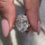 Avideri Ring with an oval cut diamond, offering a sophisticated and timeless style.