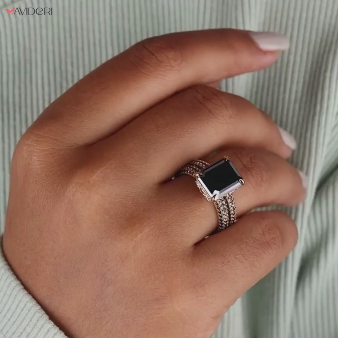 Avideri bridal set with an emerald cut moissanite ring for an elegant finish.