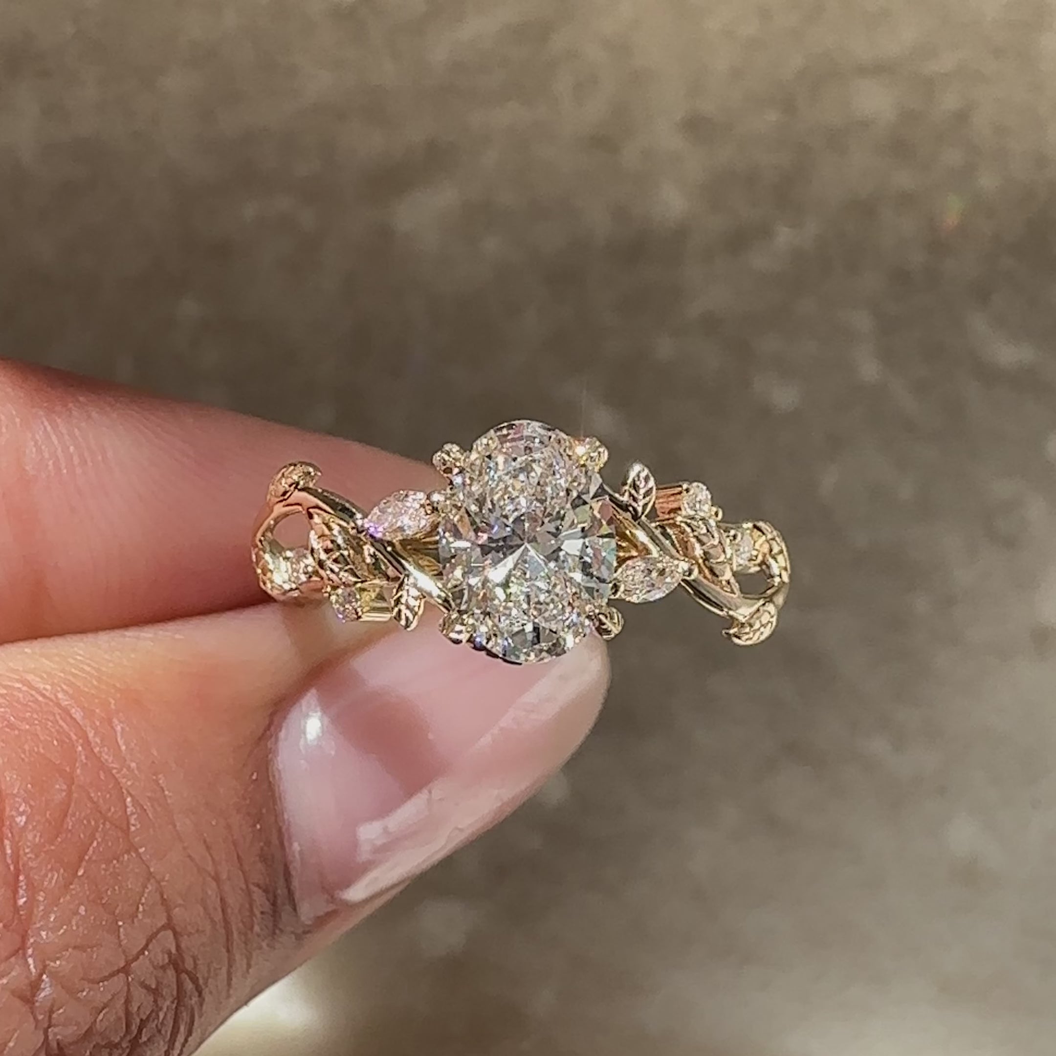 Handmade oval ring with leaf prong setting.
