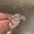Handmade oval ring with leaf prong setting.
