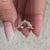 Prong setting with diamond wedding band.