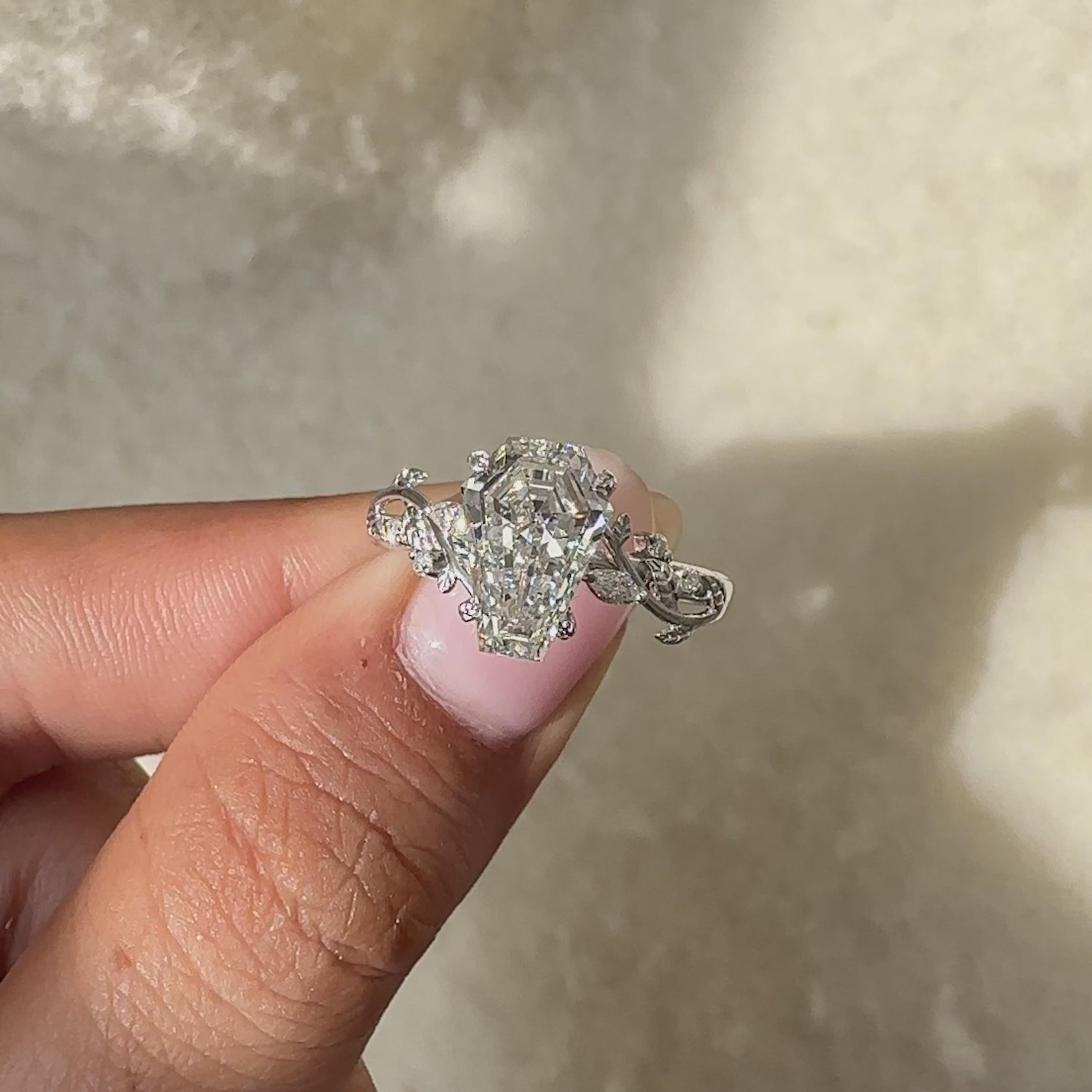 IGI certified ring with nature inspired engagement ring.