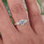 IGI certified round engagement ring featuring a tapered pave ring design for added brilliance and style.
