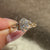 Oval ring with round side stones natural style.