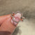 Round cut diamond band wrap guard style.
