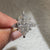 Dutch marquise engagement ring with kite and round side stones
