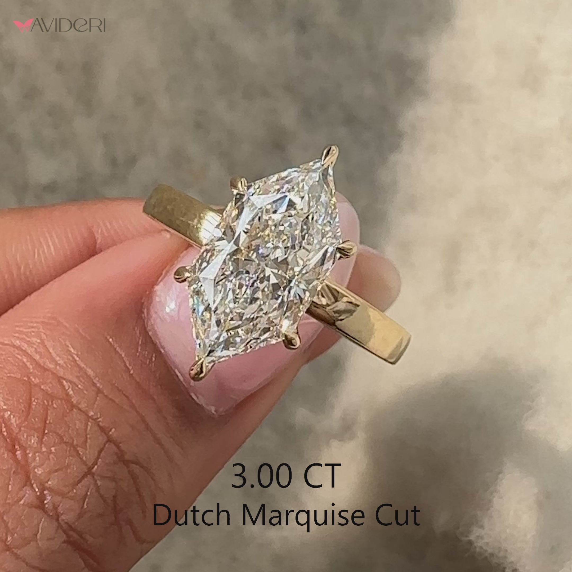 Dutch marquise cut lab grown diamond ring with hidden halo.