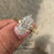 Dutch marquise cut lab grown diamond ring with hidden halo.