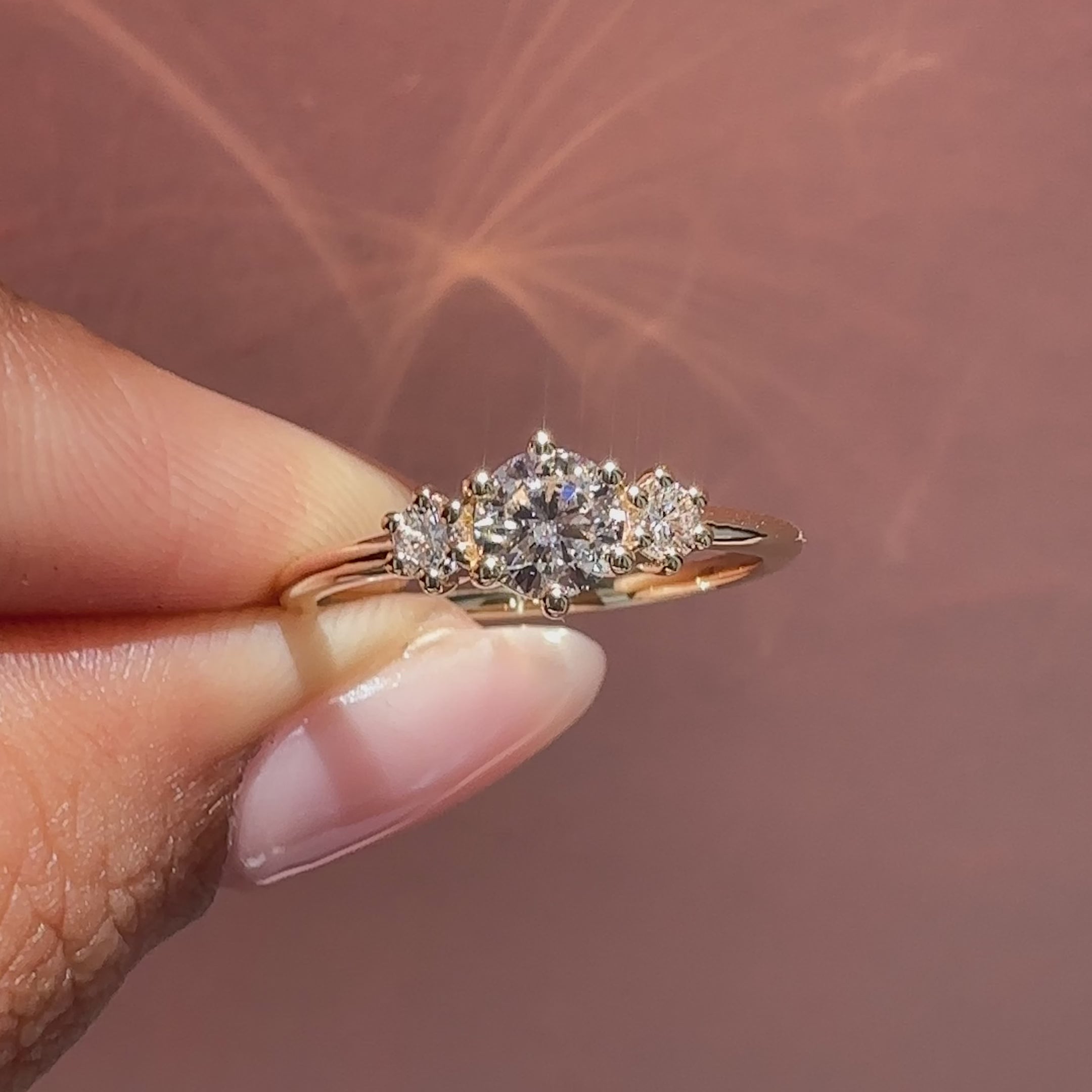 Lab grown round diamond ring three stone.
