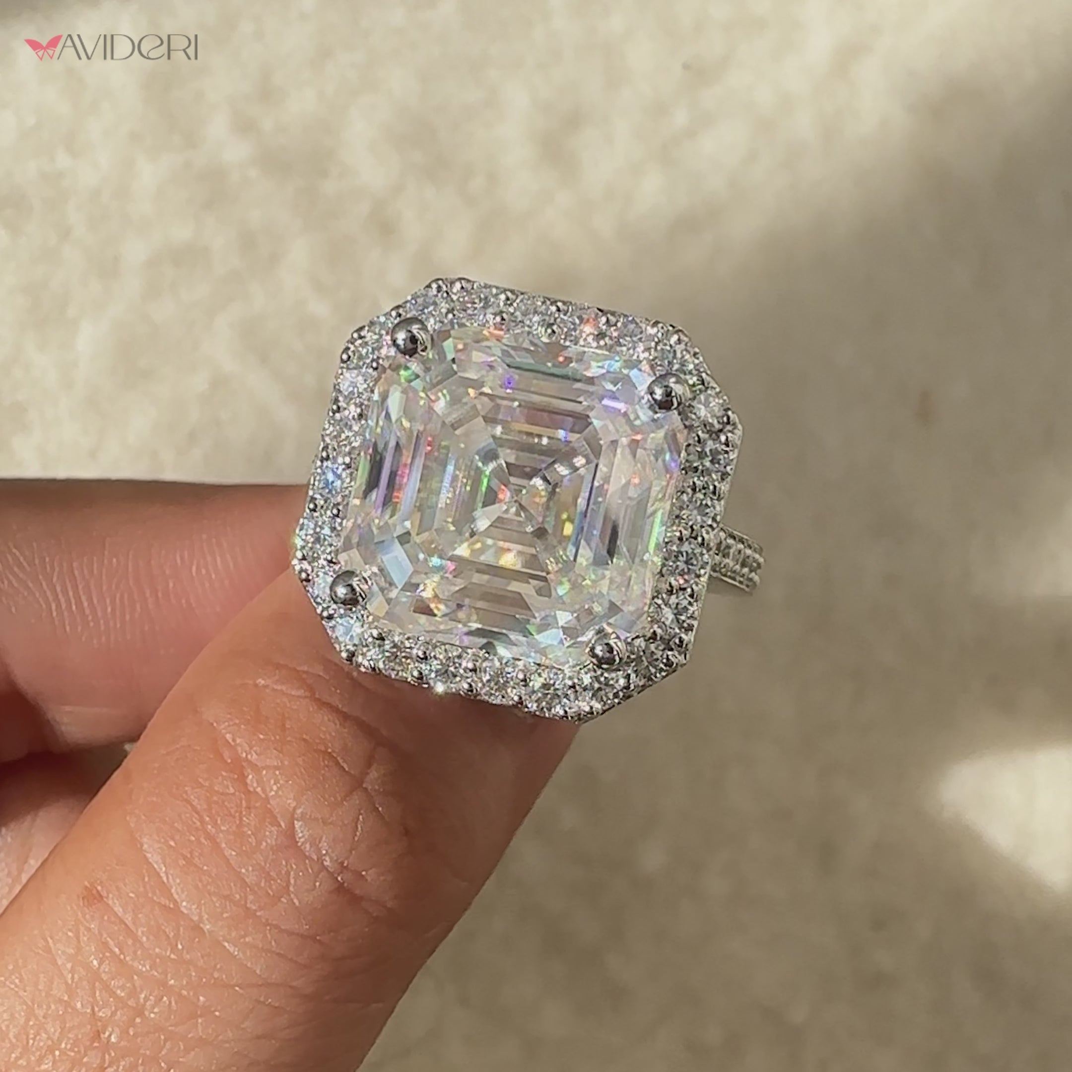 Asscher cut moissanite ring with classic four prongs.