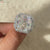 Asscher cut moissanite ring with classic four prongs.