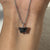 Solitaire pendant gold with a butterfly design for a stunning look.
