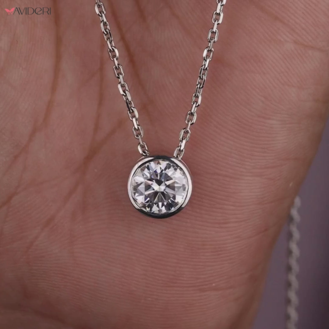 Round cut pendant with a round moissanite stone for added brilliance.

