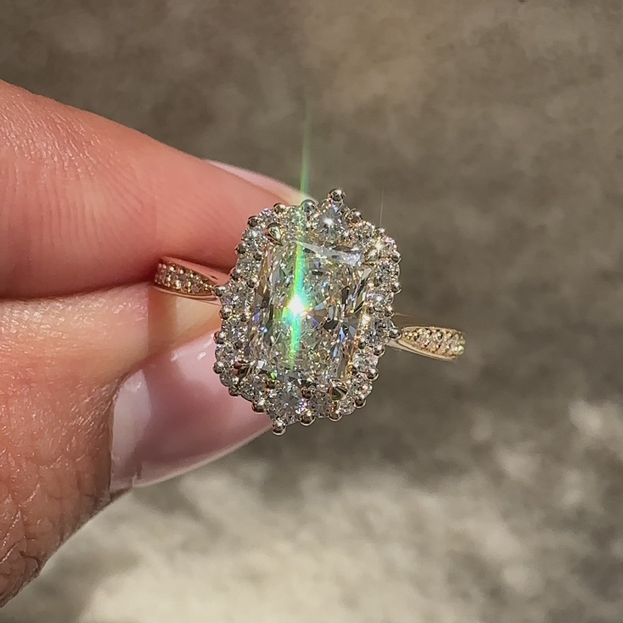 Tapered shank radiant diamond ring handmade.