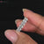 Six stone diamond ring featuring a low set handmade design
