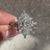 Nature style marquise ring with side stones.

