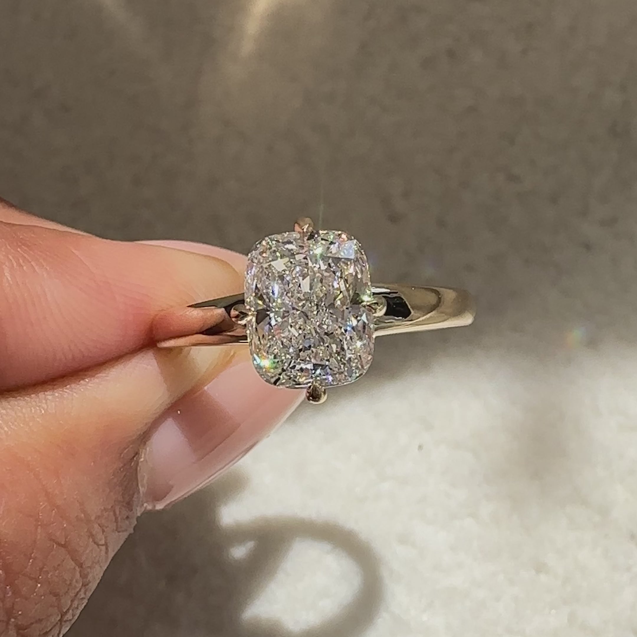 Handmade cushion ring with solitaire design.
