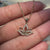 The handmade pendant reflects careful attention to detail and care.