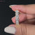 6 stone diamond band featuring bezel set design.
