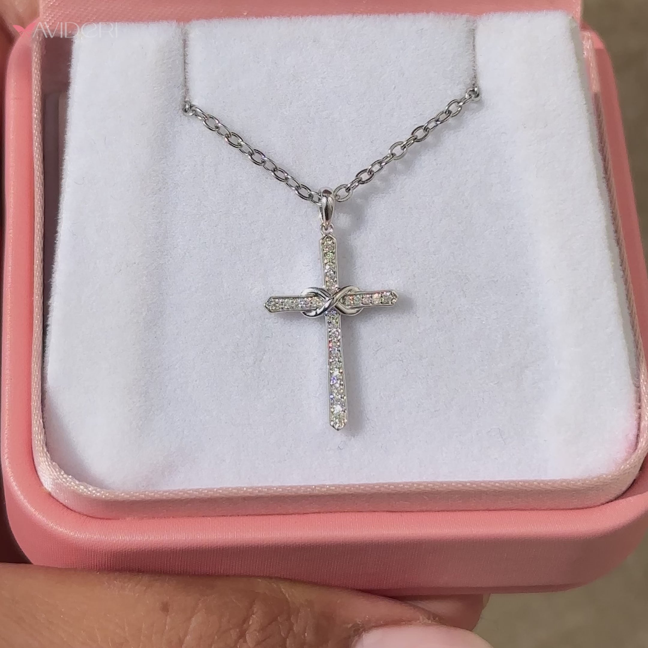 Handmade diamond pendant in a cross style.