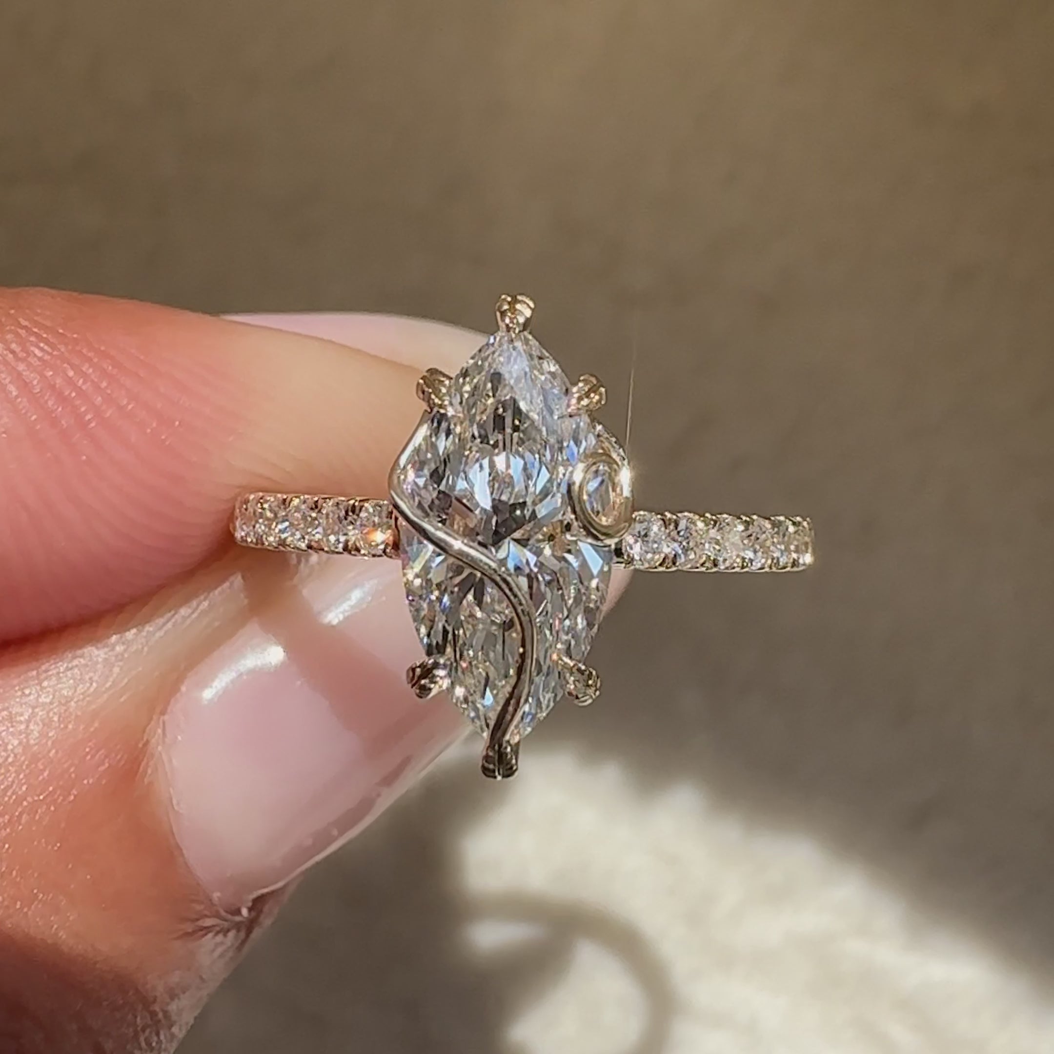 Avideri marquise diamond ring with pave setting.