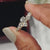 diamond engagement ring showcasing a round cut diamond in a stunning prong setting for a classic and elegant look.
