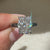 Handmade three stone radiant diamond ring.
