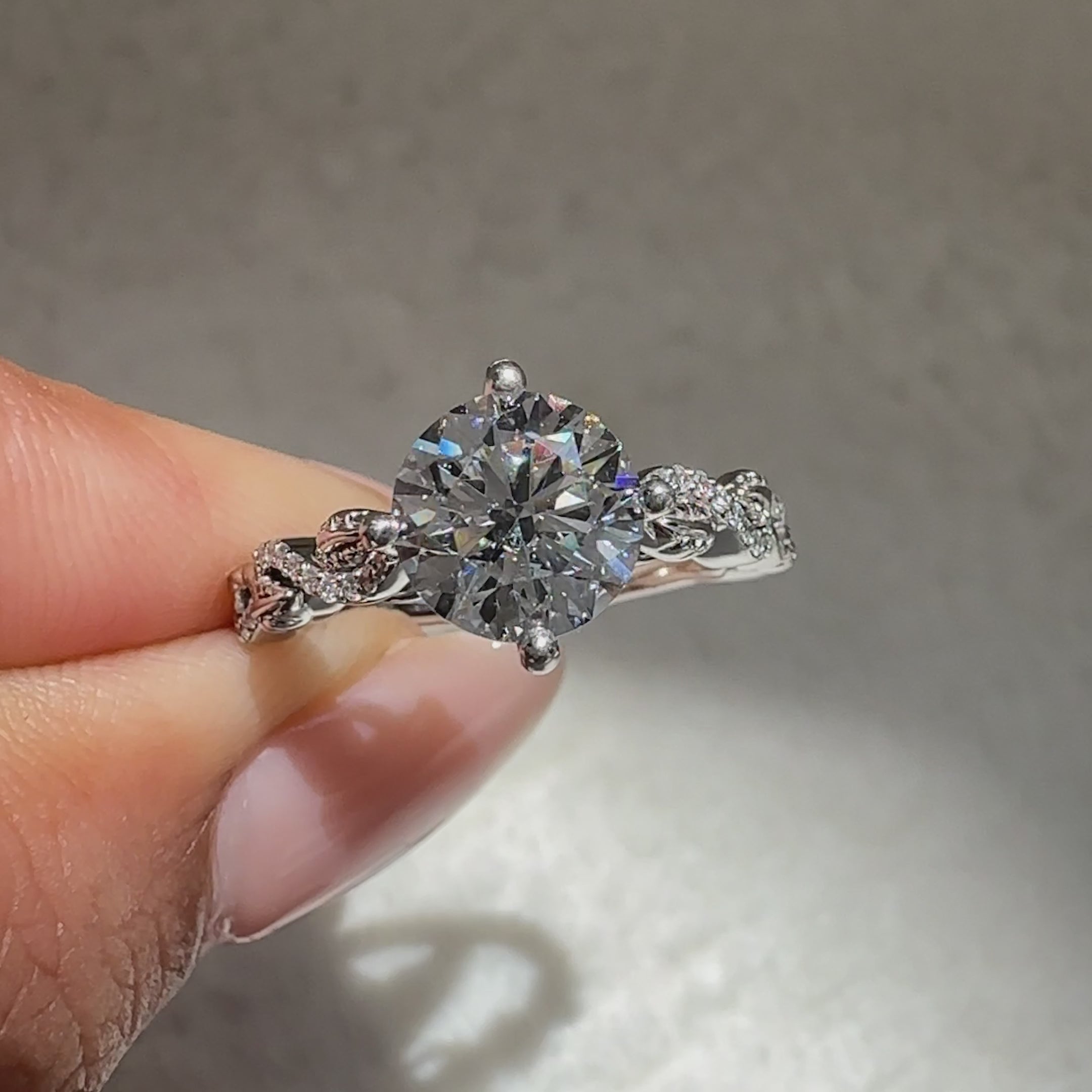 Twisted pave diamond ring with round stones.
