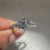Twisted pave diamond ring with round stones.
