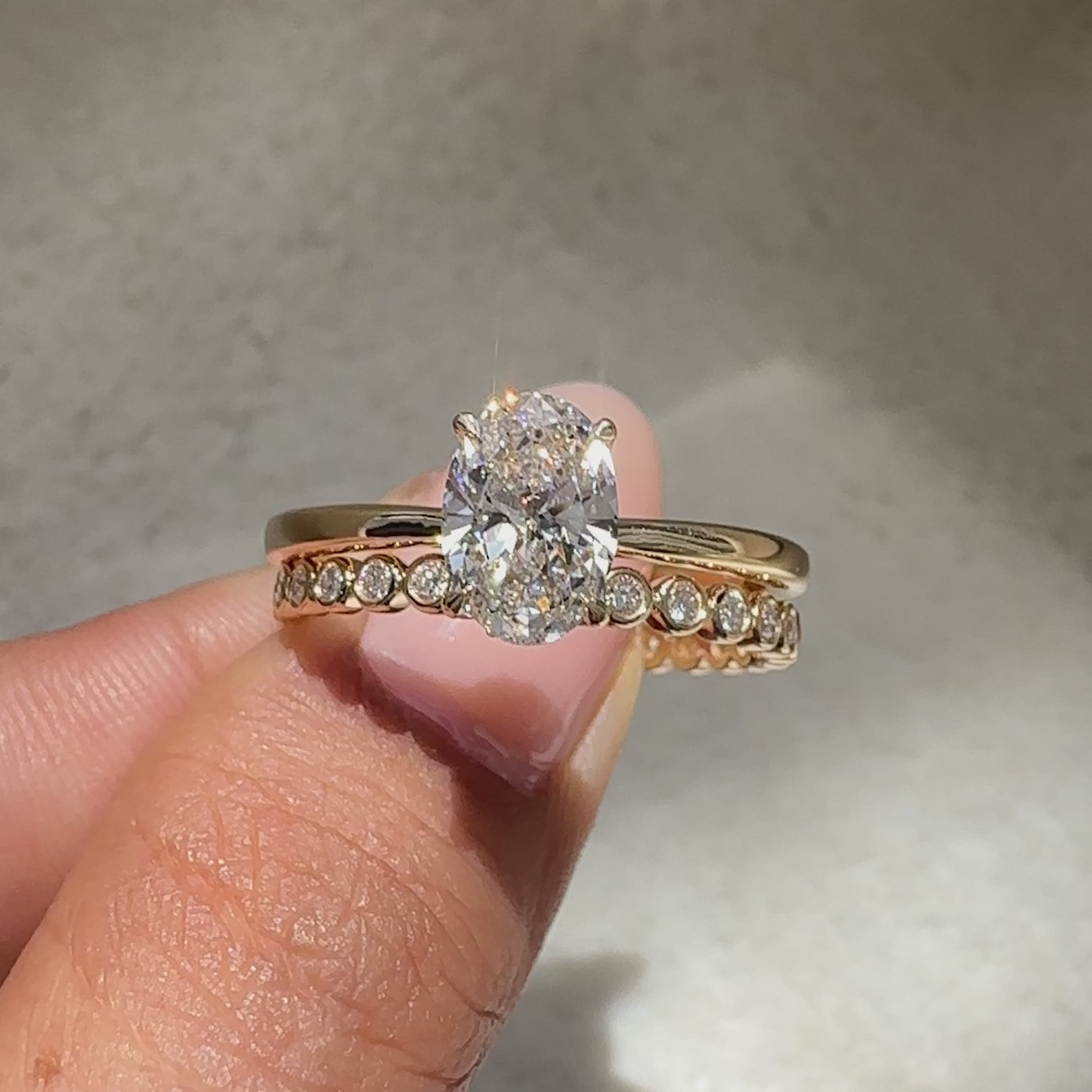 Lab grown diamond oval ring hidden halo.
