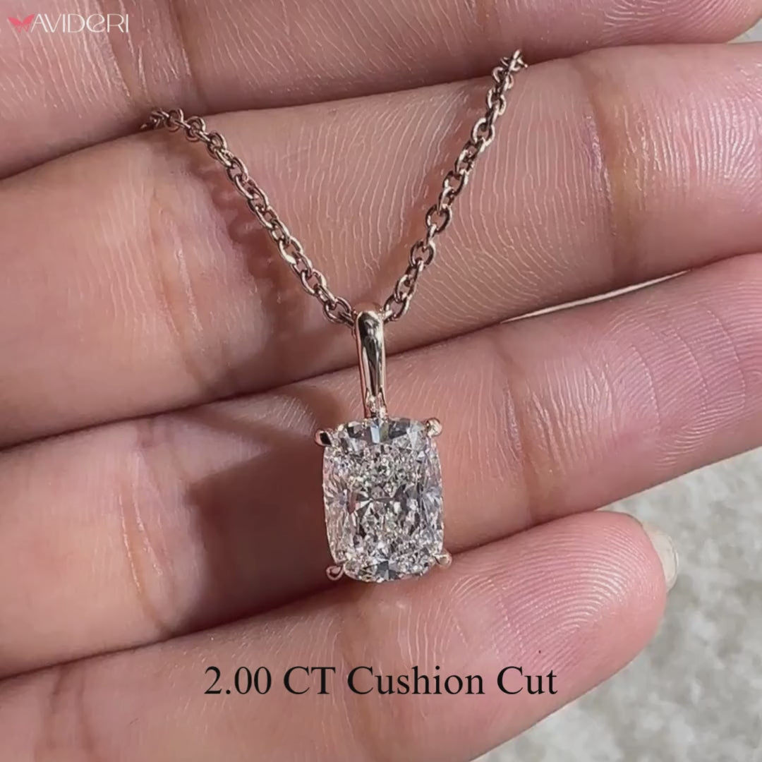 Fancy pendants in rose gold with cushion cut diamonds.