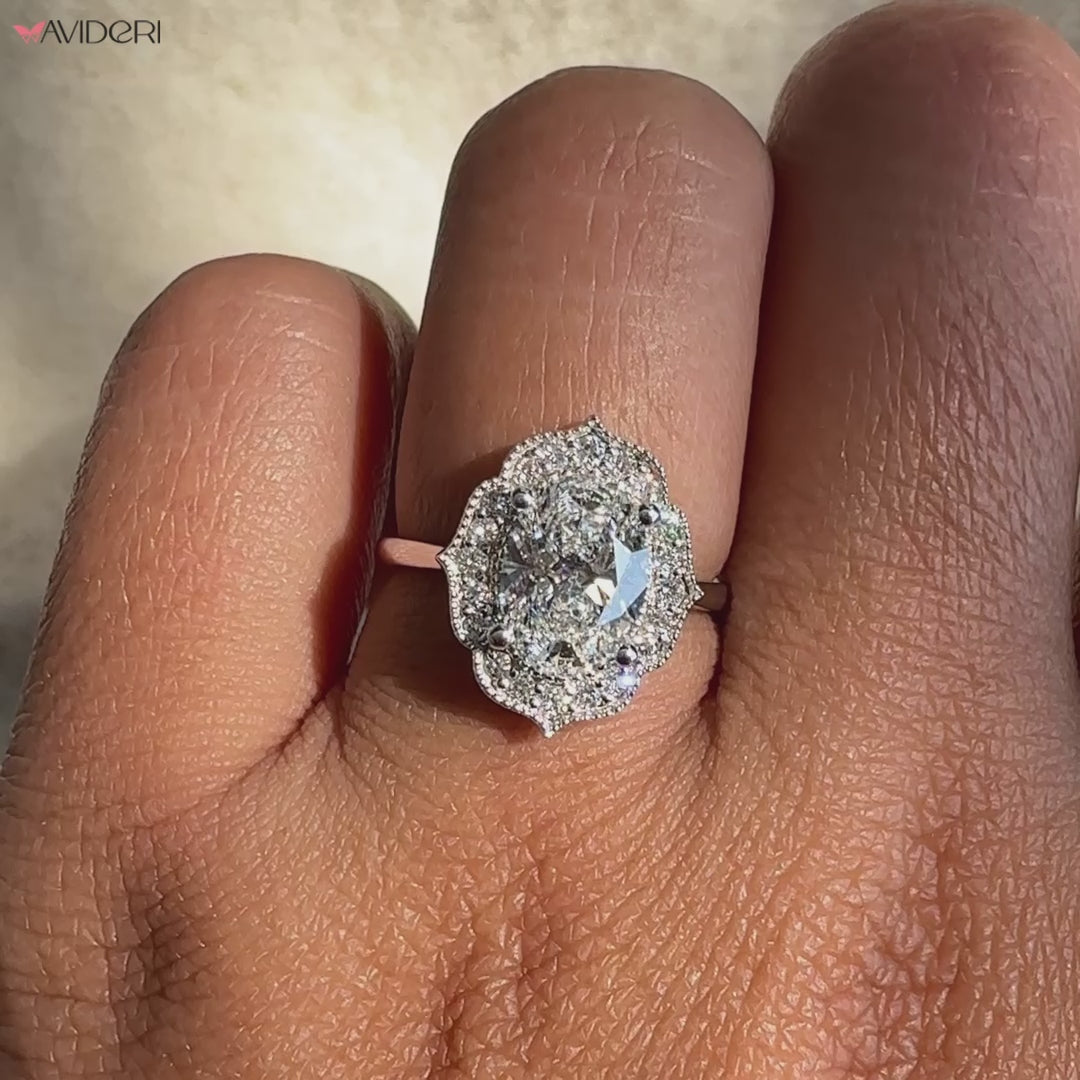 Avideri Ring with a classic halo design and white gold prong setting.