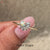 Handmade heart cut diamond ring with delicate craftsmanship.
