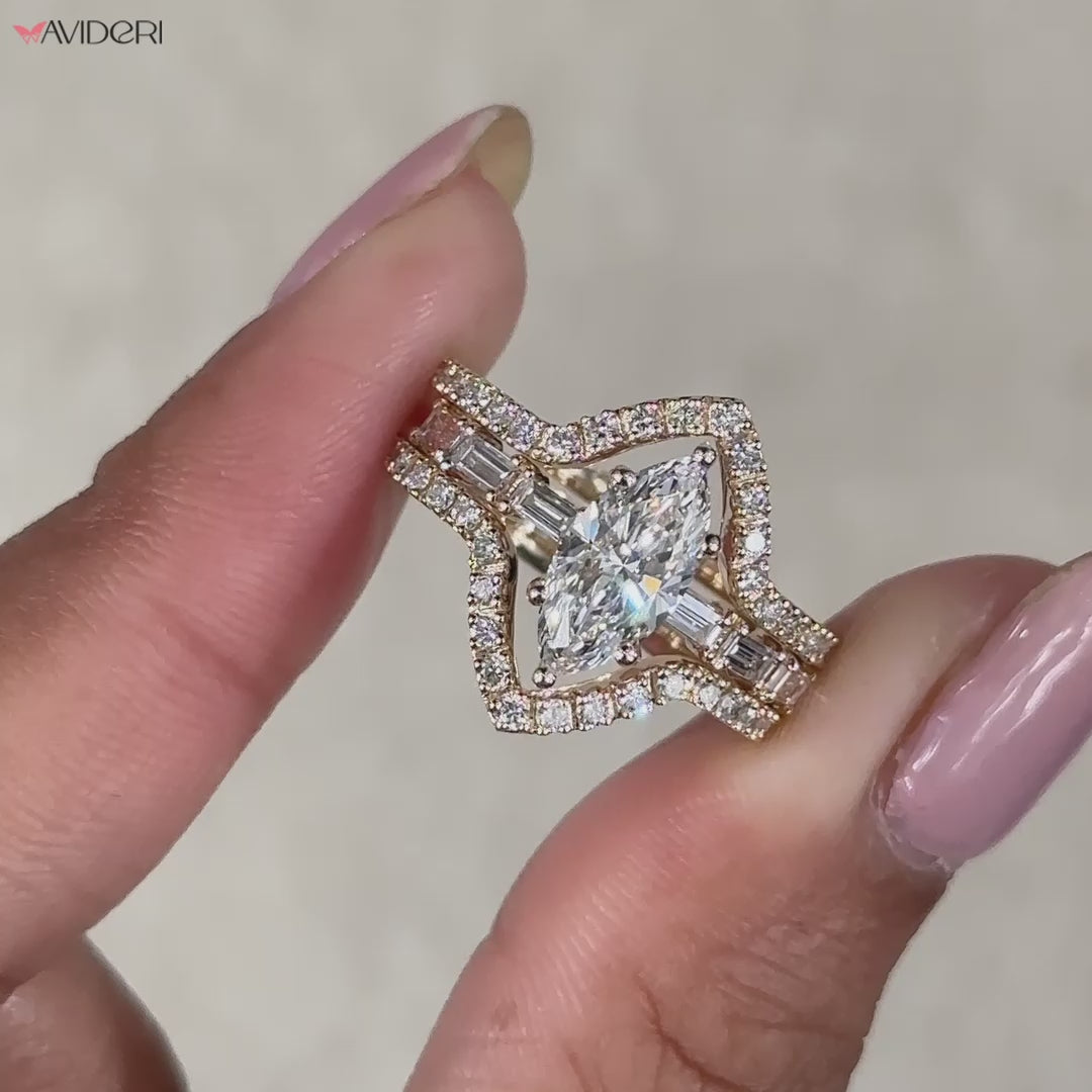Marquise cut engagement ring in pave setting ring.